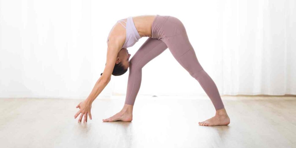 Standing Separate Leg Head to Knee Pose Dandayamana-Bibhaktapada-Janushirasana