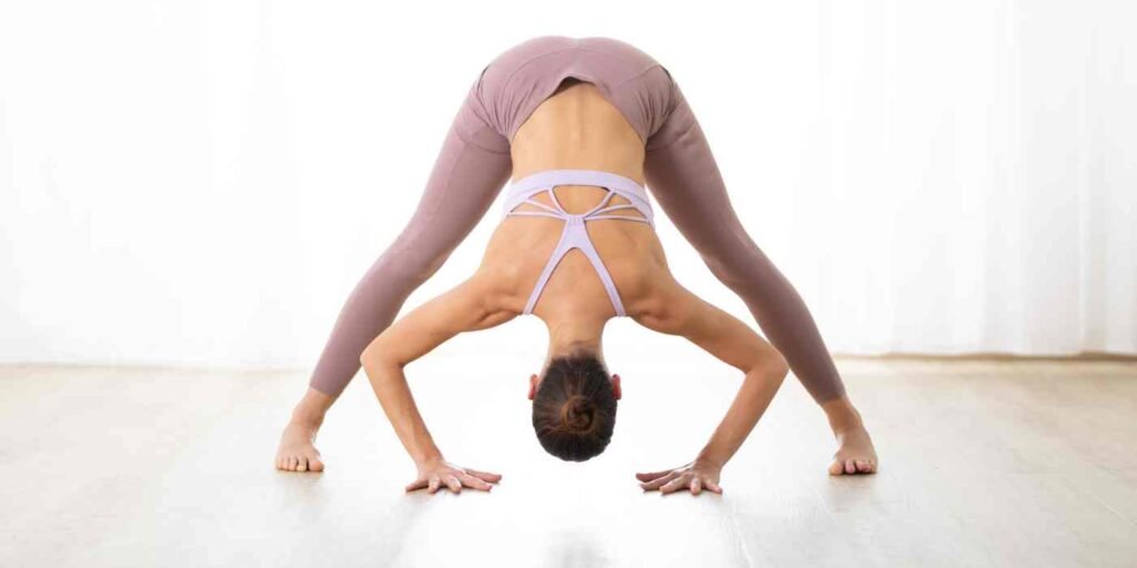 Standing Separate Leg Stretching Pose Dandayamana-Bibhaktapada-Paschimotthanasana
