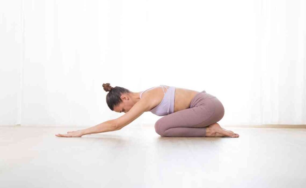 balasana or child's pose in yoga
