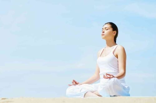 meditating at the beach