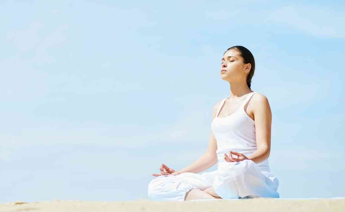 meditating at the beach