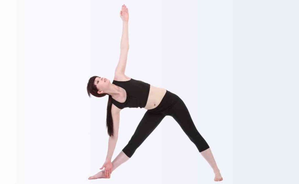 utthita trikonasana or extended triangle pose in yoga